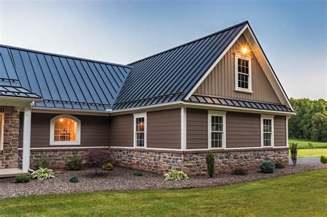 brown brick house with metal roof|brick and shingle combinations.